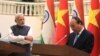Indian Prime Minister Narendra Modi, left, listens to Vietnamese Prime Minister Nguyen Xuan Phuc during a press conference in Hanoi, Vietnam, Sept. 3, 2016. The two countries have agreed to upgrade a “strategic partnership,” giving Vietnam more Indian market access.