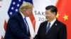 中国国家主席习近平2019年6月29日在大阪G20峰会之前与美国总统特朗普握手。
