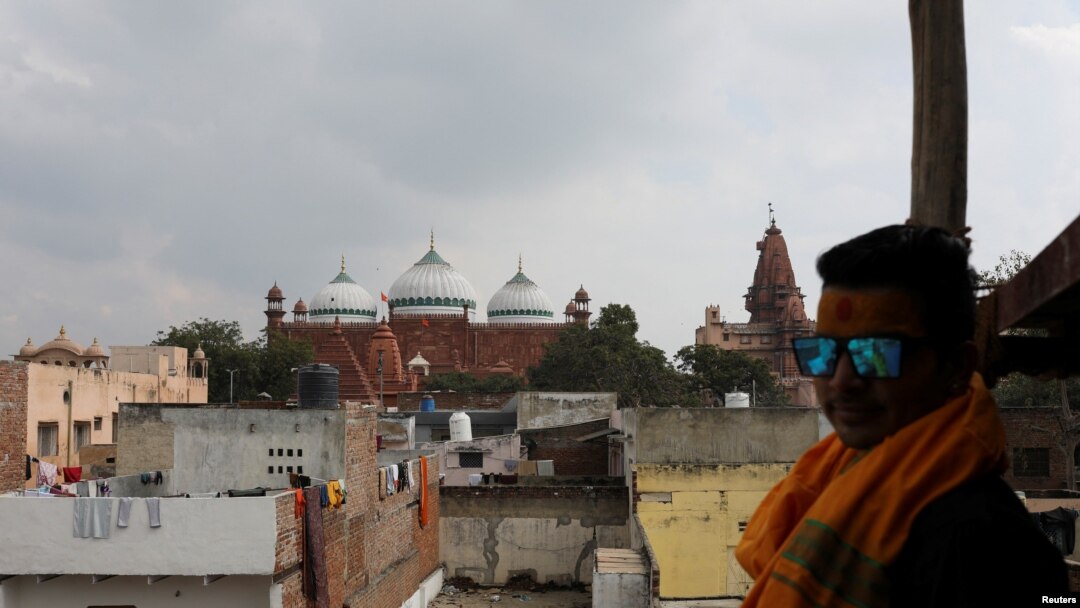 The Shahi Eidgah mosque and the Hindu temple are seen side-by-side in Mathura town, in the northern state of Uttar Pradesh, India, Jan. 24, 2022. 