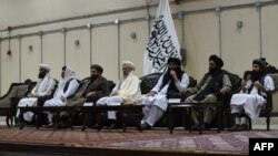 FILE - Taliban leaders participate in a conference in Kabul, Afghanistan, April 3, 2022. 