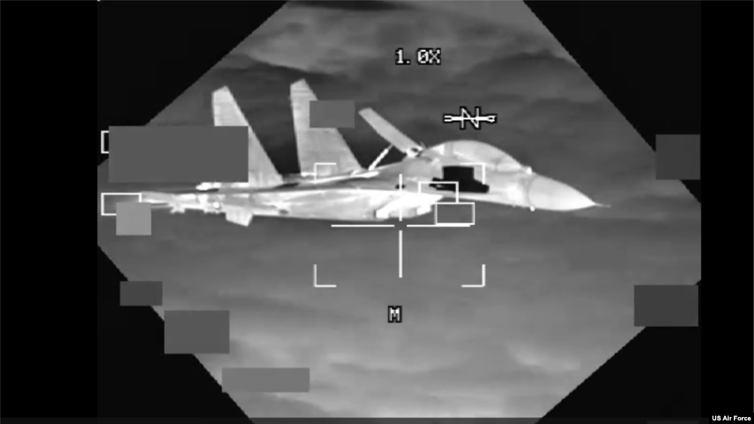 A People’s Republic of China J-11 aircraft is shown in this screen grab from U.S. Air Force B-52 video on Oct. 24, 2023. The U.S. Indo-Pacific Command said the PRC pilot "flew in an unsafe and unprofessional manner," and flew within 10 feet of the B-52.