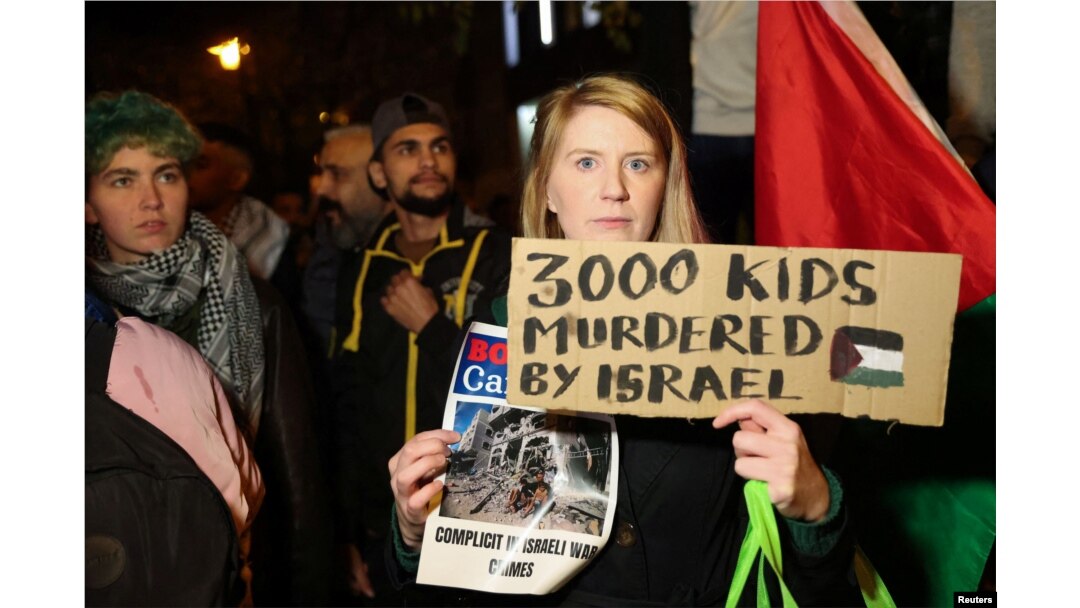 People take part in a protest in support of Palestinians in Gaza, amid the ongoing conflict between Israel and Hamas, in Brussels, Belgium, Oct. 26, 2023.