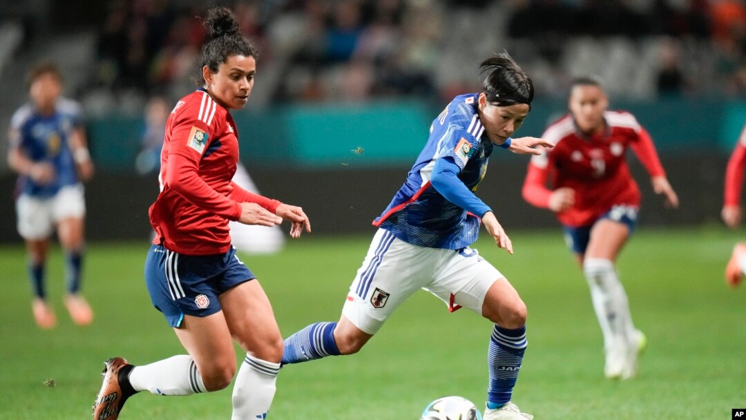 Costa Rica's Raquel Rodriguez, left, and Japan's Hikaru Naomoto compete for the ball during the Women's World Cup Group C soccer match between Japan and Costa Rica in Dunedin, New Zealand, July 26, 2023.