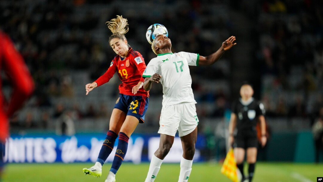 Spain's Olga Carmona, left, jumps for the ball with Zambia's Racheal Kundananji during the Women's World Cup Group C soccer match between Spain and Zambia at Eden Park in Auckland, New Zealand, July 26, 2023.