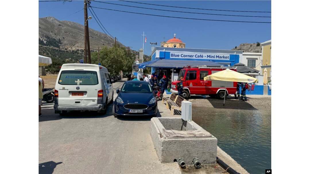 A view of an ambulance and a fire brigade van are on a beachfront of Symi island, Greece, June 9, 2024.