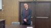 A video released by Moscow City Court shows U.S. citizen Joseph Tater in Moscow as he is sentenced to 15 days in jail for petty hooliganism, according to a Telegram channel monitoring the city's courts. 