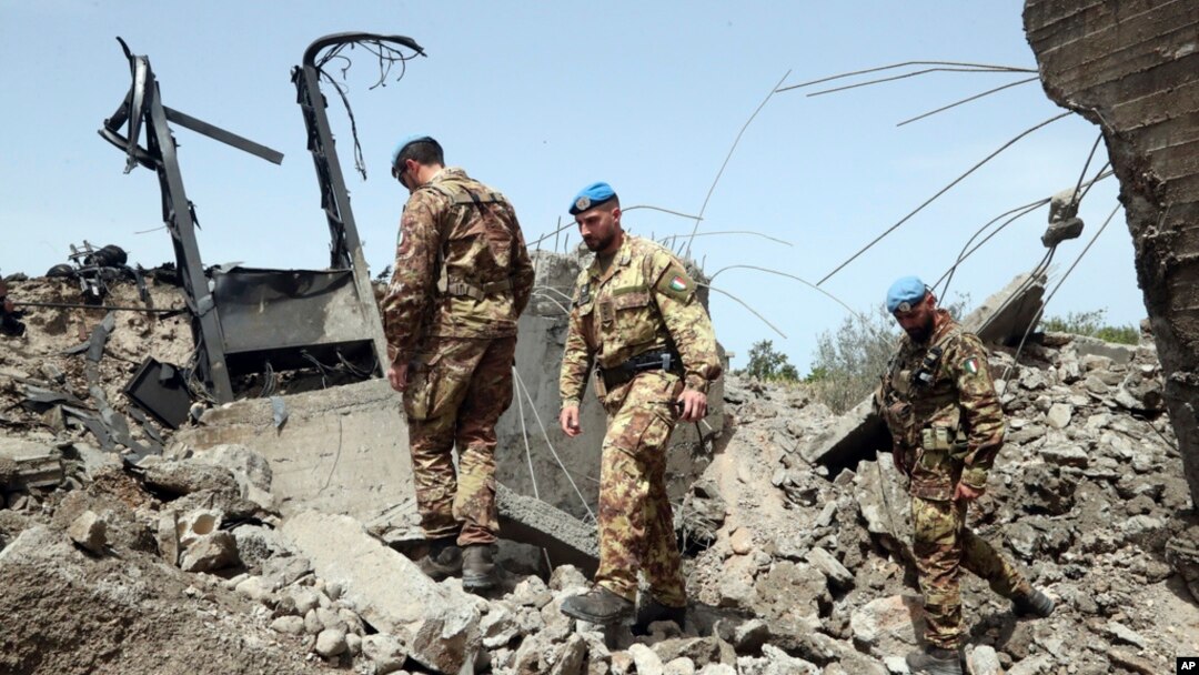 U.N. peacekeepers inspect a bridge hit by an Israeli airstrike, in Maaliya, Lebanon, April 7, 2023. Israel launched rare strikes in southern Lebanon early Friday and bombed targets in the Gaza Strip. The strikes followed violence this week at Jerusalem's most sensitive holy site.