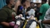 Amputation or Risk Death? Gaza Wounded Face Hard Decisions 