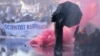 Police use a water cannon during a protest and blockade of a major highway in the downtown area near where it runs past the temporary home of the Dutch parliament, during a climate protest in The Hague, Netherlands, March 11, 2023.