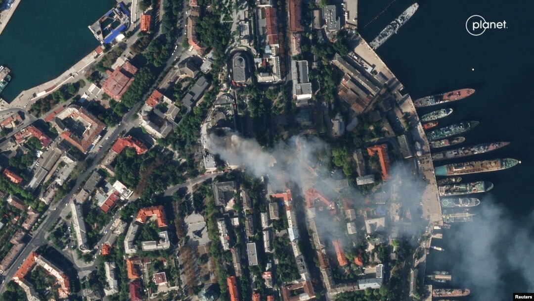 A satellite image shows smoke billowing from a Russian Black Sea Navy headquarters after a missile strike, as Russia's invasion of Ukraine continues, in Sevastopol, Crimea, Sept. 22, 2023. (Planet Labs PBC/Handout via Reuters)