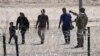 AQSh-Meksika chegarasiga yetib kelgan migrantlar, Meksika, 10-may, 2023. 