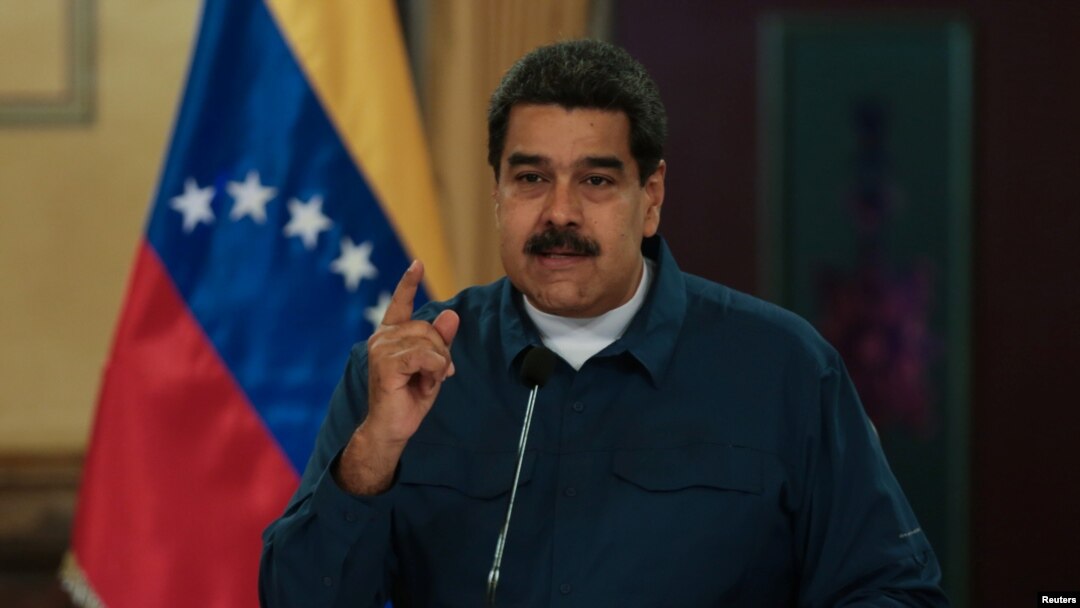 Venezuela's President Nicolas Maduro speaks during a meeting with ministers at the Miraflores Palace in Caracas, Venezuela, Aug. 13, 2018. 