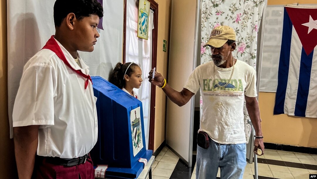 A man casts his vote at a polling station during the first round of municipal elections for councilors in Havana, Cuba, Nov. 27, 2022.
