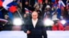 Prezidan Ris la Vladimir Putin pwononse yon diskou pandan yon konse pou make 8em anivese referandom sou eta Krime ak Sevastopol ak reyinifikasyon yo ak La Risi, nan Moskou, Vandredi 18 Mas, 2022.