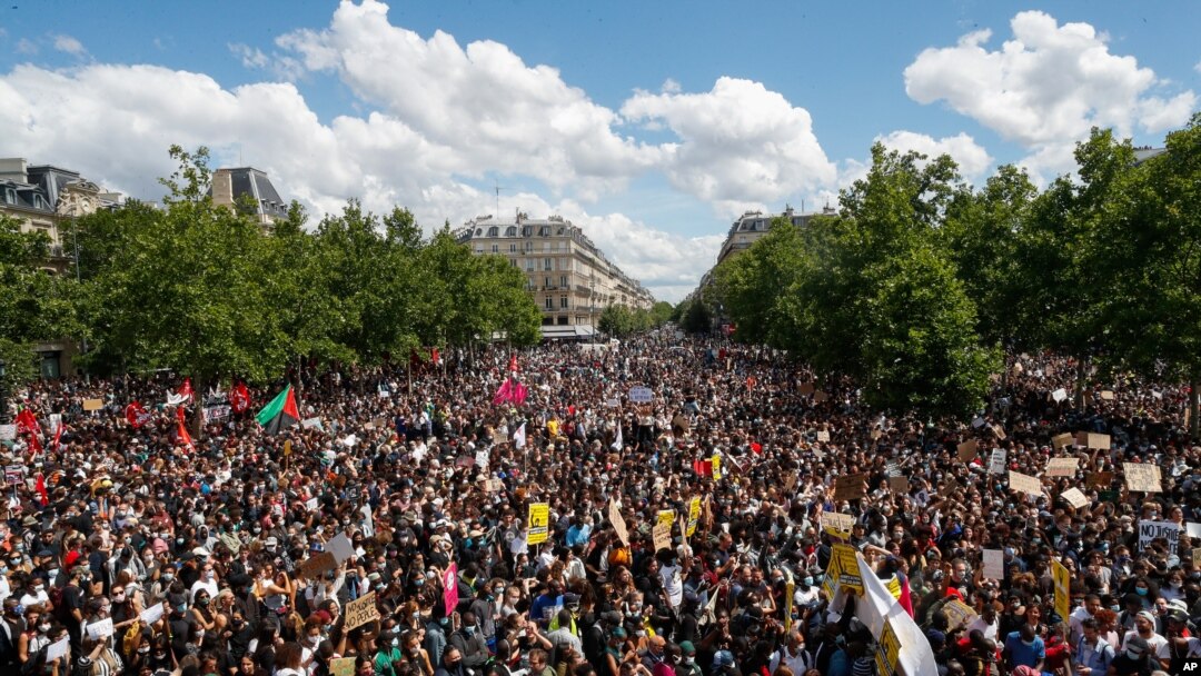 Thousands of people demonstrate against police brutality and racism in Paris, France, June 13, 2020, prior to a march organized by supporters of Adama Traore, who died in police custody in 2016 in circumstances that remain unclear.