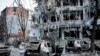 Damaged vehicles and buildings in Kharkiv city center in Ukraine, March 16, 2022. 