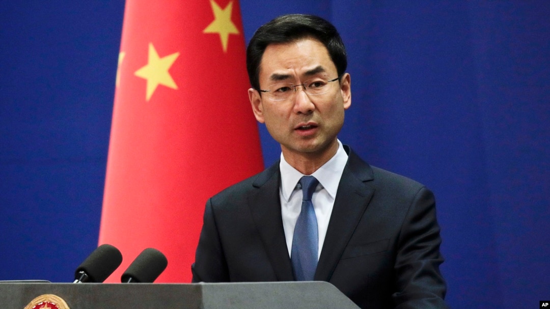 FILE - Chinese Foreign Ministry spokesman Geng Shuang speaks during a daily briefing at the Ministry of Foreign Affairs office in Beijing, Jan. 29, 2019.