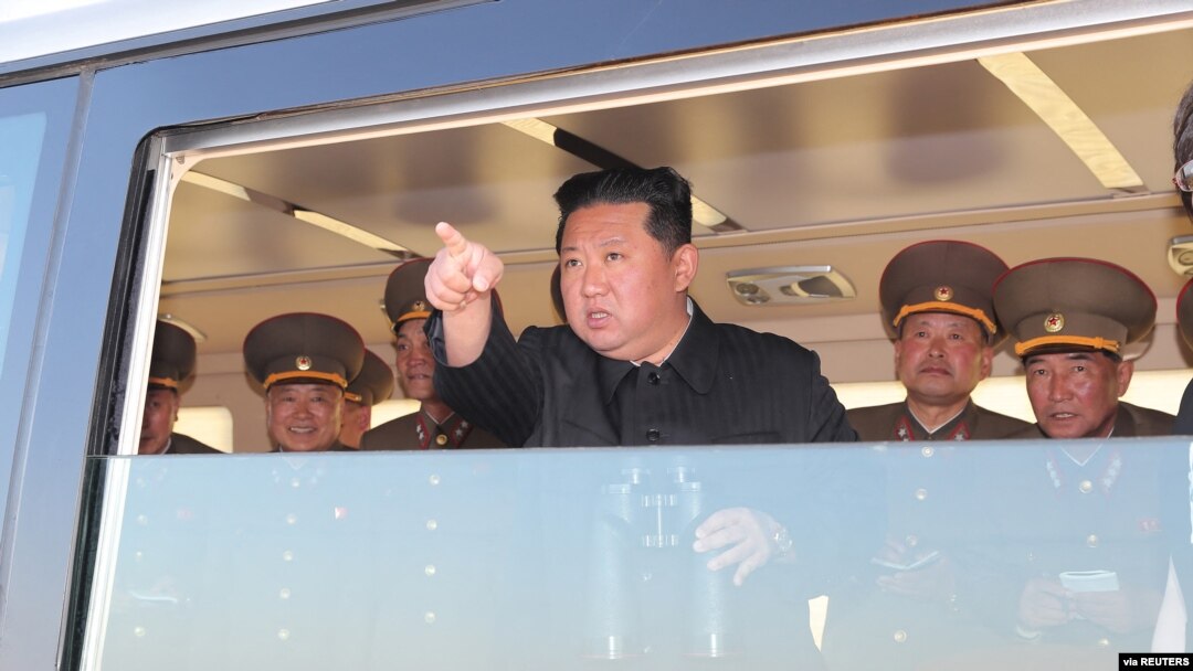 FILE - North Korean leader Kim Jong Un watches the test-firing of a tactical guided weapon in this undated photo released April 16, 2022, by North Korea's Korean Central News Agency. Japan and South Korea have reported that North Korea conducted a missile launch on Wednesday.