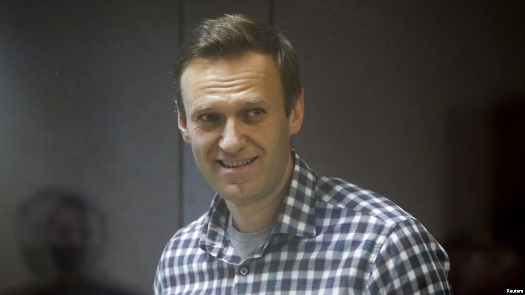 FILE - Russian opposition politician Alexey Navalny attends a court hearing in Moscow, Russia, Feb. 20, 2021. 