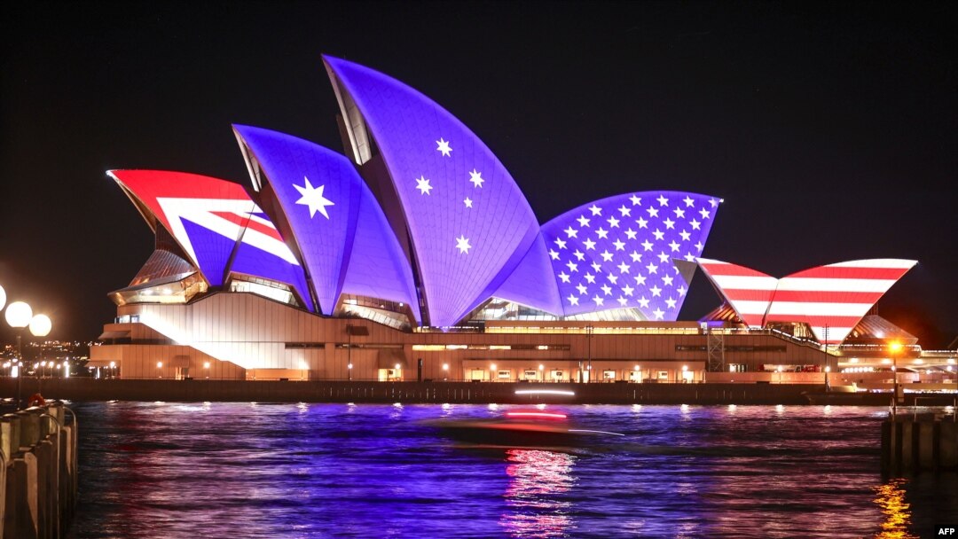 The flags of the US and Australia are projected onto the sails of the Opera House to commemorate the 70th anniversary of the alliance between Australia, New Zealand and the US known as the ANZUS Treaty in Sydney on Sept. 1, 2021. 