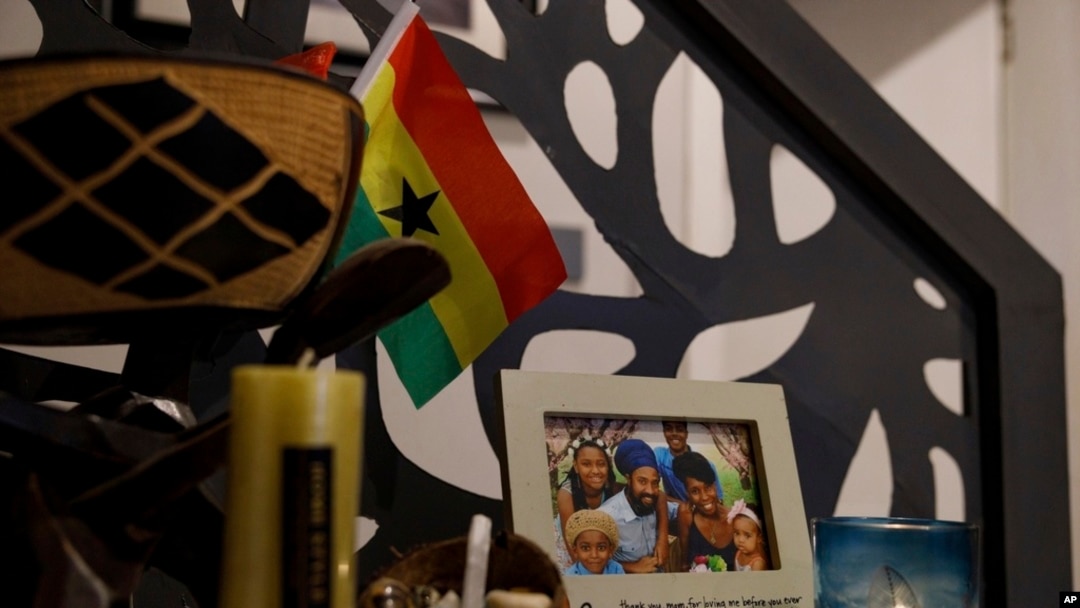 FILE - A family photo of Keachia Bowers, Damon Smith, and their children sits in their home in Accra, Ghana, Dec. 6, 2024. The family relocated to Ghana from Florida and has obtained Ghanaian citizenship.