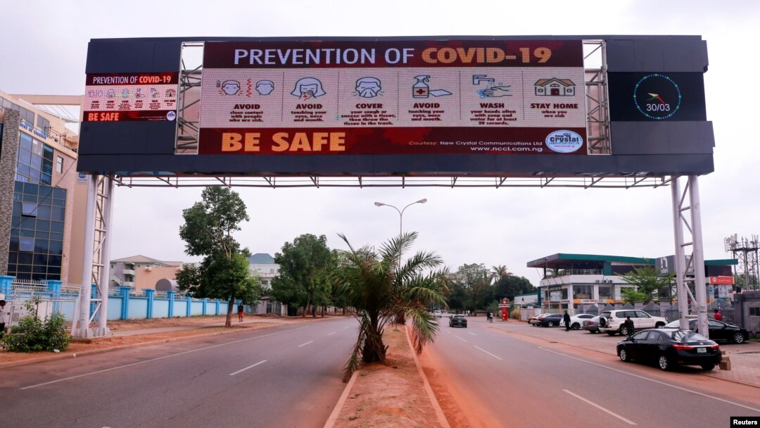A few cars are pictured on a road, as authorities try to limit the spread of the coronavirus disease (COVID-19) in Abuja, Nigeria, March 30, 2020. 
