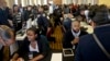 Job seekers attend the New York Department of Citywide Administrative Services (DCAS) 2016 job fair, Nov. 2, 2016, in New York. 