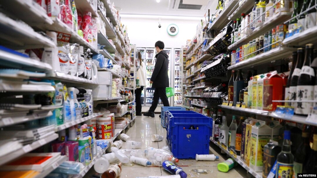 Scattered goods caused by an earthquake are seen at a convenience store in Sendai, Miyagi prefecture, Japan, March 17, 2022, in this photo taken by Kyodo. (Kyodo/via Reuters)