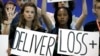 Activists encourage world leaders to maintain policies that limit warming to 1.5 degrees Celsius and provide reparations for loss and damage at the COP27 UN Climate Summit, Nov. 19, 2022, in Sharm el-Sheikh, Egypt.