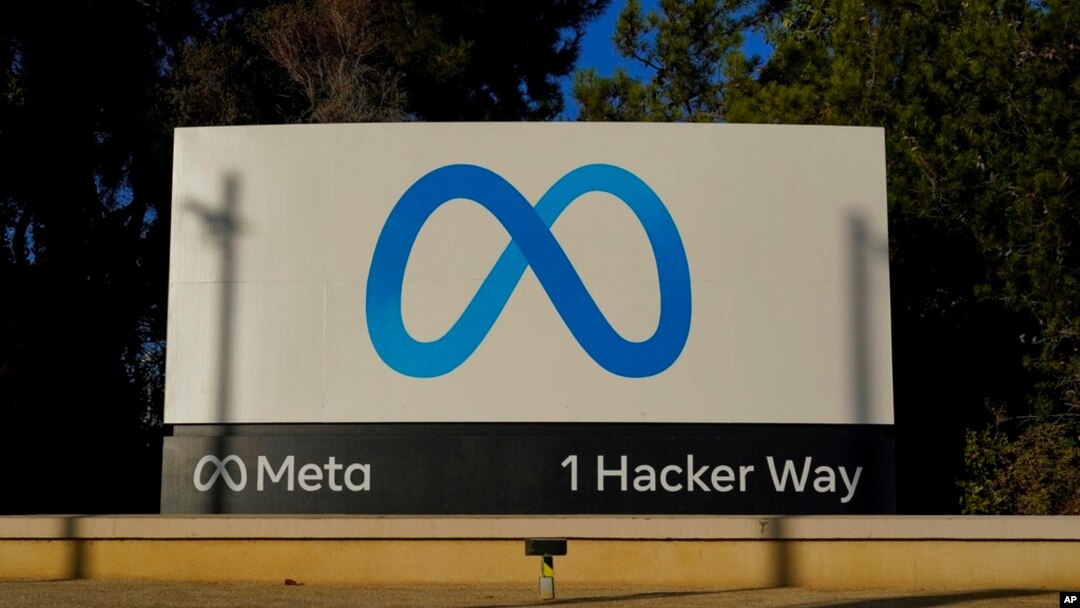 FILE - Meta's logo can be seen on a sign at the company's headquarters in Menlo Park, Calif., on Nov. 9, 2022.