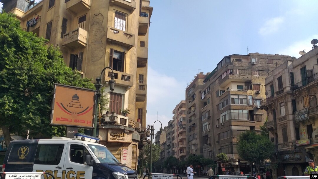An Egyptian police van blocks a street leading to Cairo's Tahrir square, Sept. 27, 2019, in anticipation of anti-government protests.