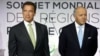 Former governor of California and founding chair of the R20 initiative, Arnold Schwarzenegger, left, and France's Foreign Minister Laurent Fabius, stand prior to making a speech at the World Summit of Regions for Climate, in Paris, Oct. 11, 2014.