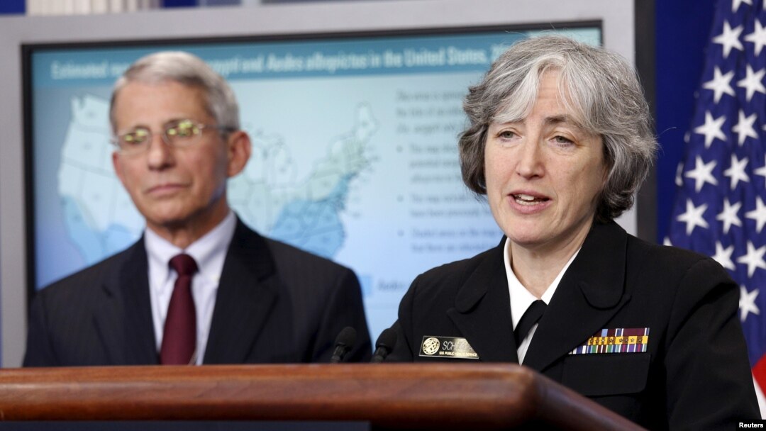FILE - Dr. Anne Schuchat, principal deputy director for Centers of Disease Control Prevention, right, and Dr. Anthony Fauci, director of the National Institute for Allergy and Infectious Disease, speak at the White House in Washington, April 11, 2016.