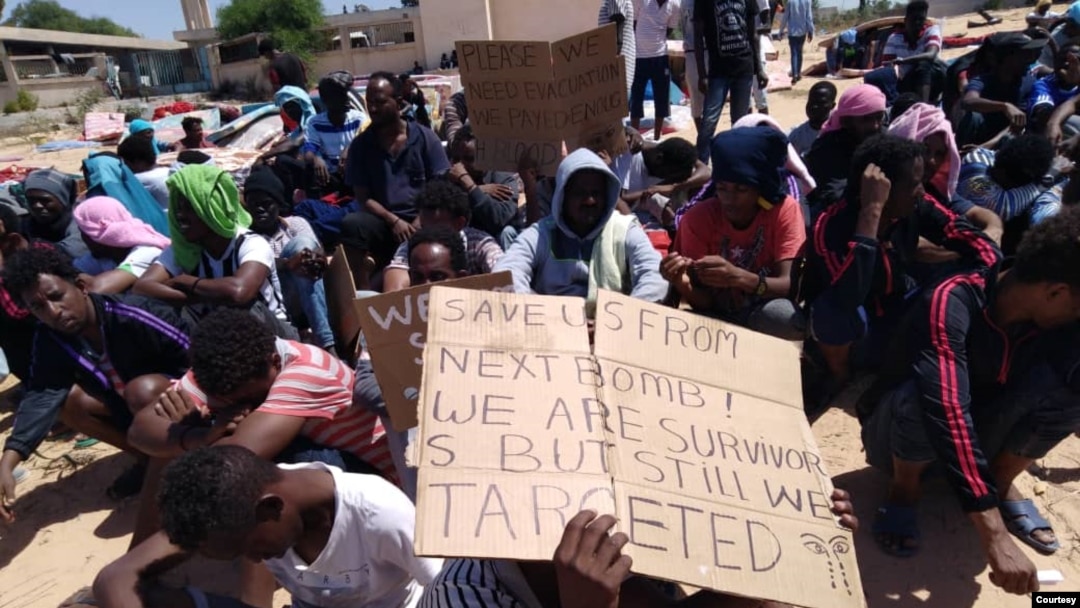 The migrants say they fled war, violence and abject poverty and risked their lives for the chance at a better life in Europe, before being captured and held in Tripoli. Photographed and transmitted to VOA July 7, 2019, in Tripoli, Libya.