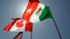 Picha ya bendera za Marekani, Canada na Mexico.