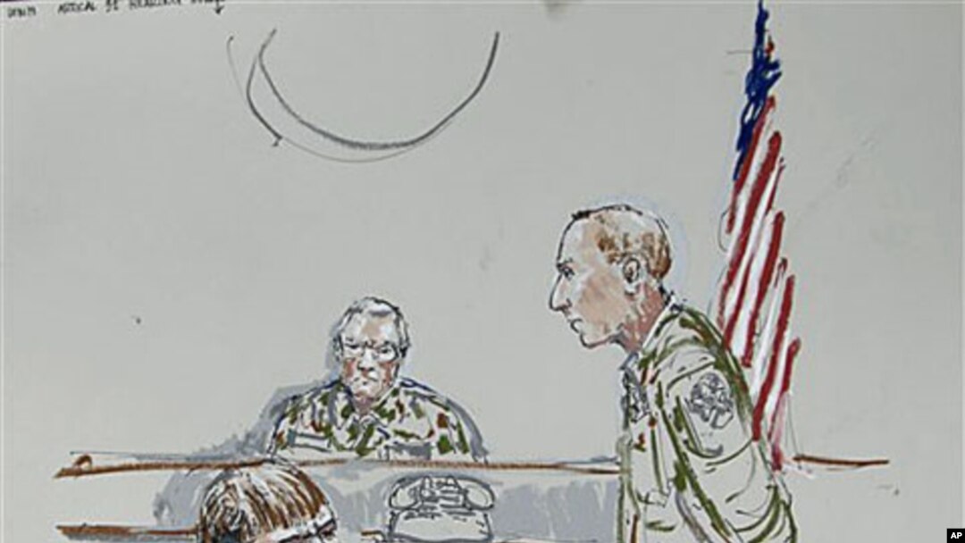 In this courtroom sketch, U.S. Army Cpl. Jeremy Morlock of Wasilla, Alaska, center, is shown as Col. Thomas Molloy, right, the investigating officer, and Morlock's attorney, Michael Waddington, left, look on, at Joint Base Lewis-McChord, Washington, Septe