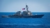 FILE - Guided-missile destroyer USS Benfold sails in the Philippine Sea, June 15, 2018. (Sarah Myers/U.S. Navy/Handout via Reuters)
