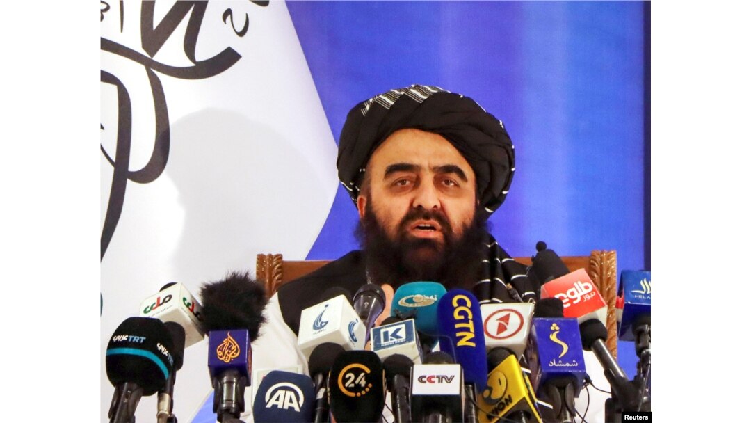FILE - Taliban Foreign Minister Amir Khan Muttaqi speaks in Kabul, Afghanistan, Sept. 14, 2021.