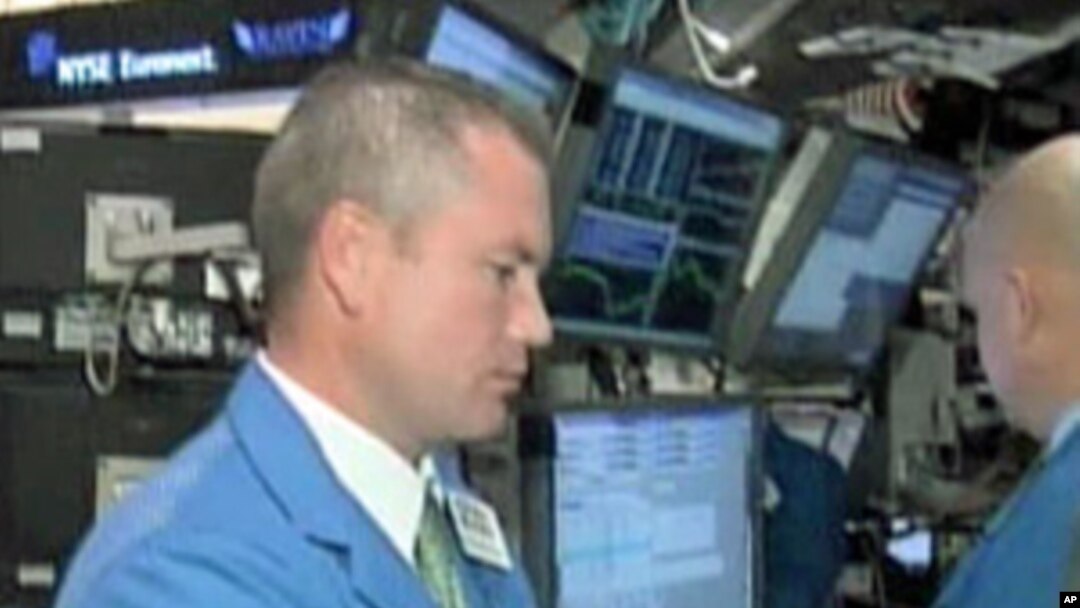 A trader at the New York Stock Exchange