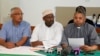 Supreme Council of Kenya Muslims secretary general Adan Wachu (C) is pictured in this August 30, 2012, file photo with Kishore Shah, trustee of the Hindu Council of Kenya (L), and Fr. Wilybard Lagho, chairman of the Coast Inter Faith Council of Clerics, i
