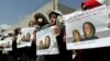 Women hold posters of Frenchwoman, Isabelle Prime (R) and her Yemeni translator Shereen Makawi, during a protest to demand their release, in San'aa, Yemen, March 9, 2015.