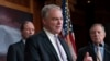 Sen. Tim Kaine, D-Va., center, joined at by Sen. Tom Udall, D-N.M., left, and Sen. Dick Durbin, D-Ill., speak after the Senate approved a bipartisan measure limiting President Trump's authority to launch military operations against Iran, Feb. 13, 2020.