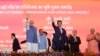 Japanese Prime Minister Shinzo Abe, right and Indian Prime Minister Narendra Modi wave during the ground breaking ceremony for high speed rail project in Ahmadabad, India, Sept. 14, 2017. 