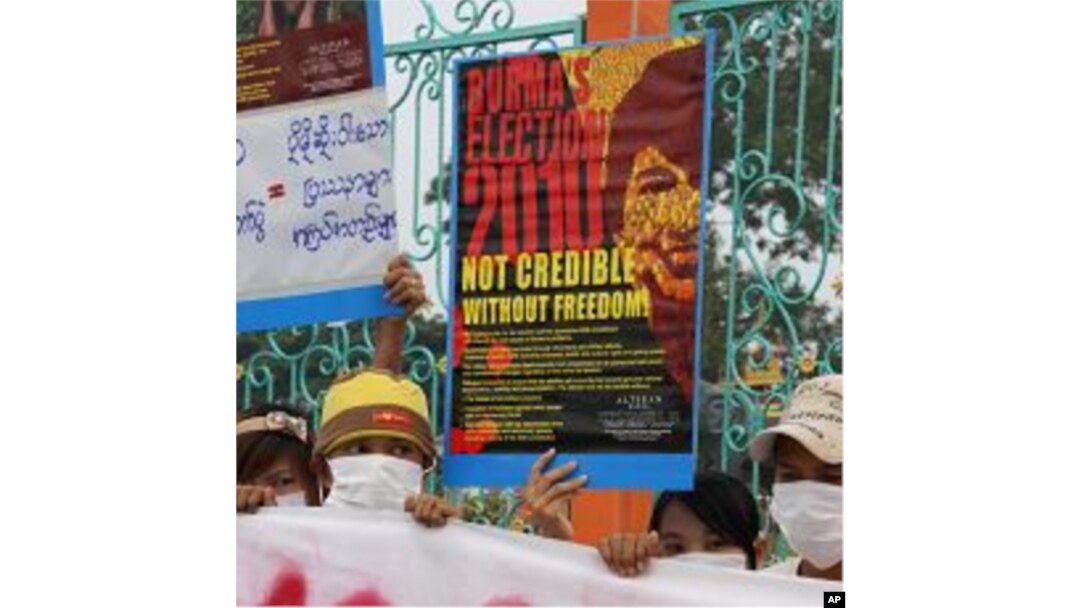 Protesters say elections held by military regime are unfair, outside a public park in Mae Sot, Thailand, 07 Nov 2010