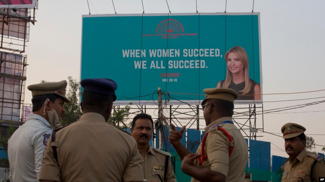 An Indian Police officer briefs his colleagues at the entrance of HITECH city, venue of the Global Entrepreneurship Summit in Hyderabad, India, Nov. 27, 2017. 