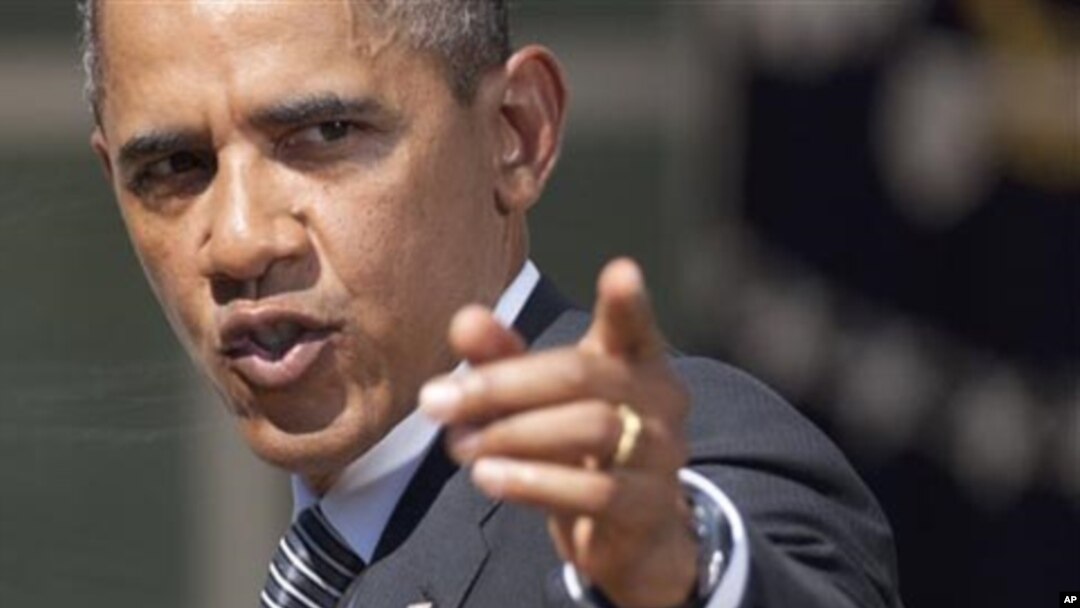 President Barack Obama gestures after a statement in the Rose Garden of the White House in Washington, where he urged Congress to pass a federal highway bill, August 31, 2011.