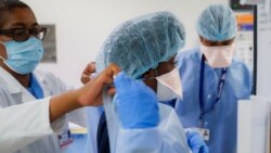 VOA Asia - More U.S. workplace vaccine mandates