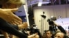 Challenger Hollande Emerges as Frontrunner in French Election