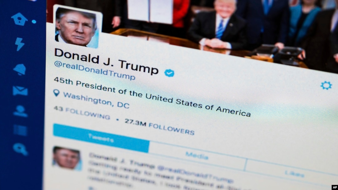 FILE - President Donald Trump's tweeter feed on a computer screen in Washington. 