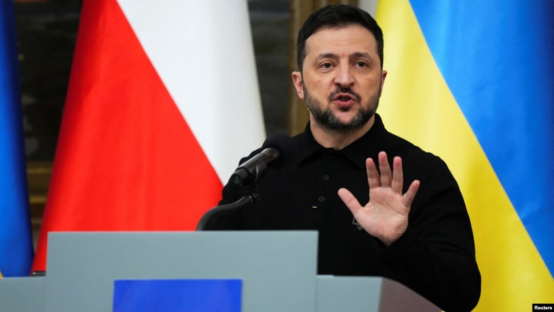 Ukraine's President Volodymyr Zelenskyy speaks at a press conference in Warsaw, Poland, Jan. 15, 2025. 